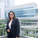 Young Indian businesswoman with a file in urban city